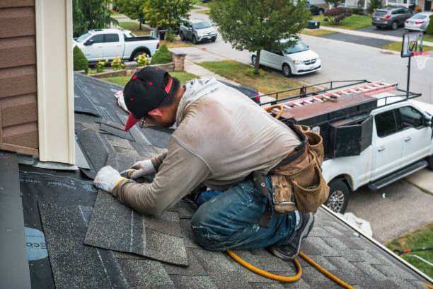 Professional Roofing technician working in Shelby, MS